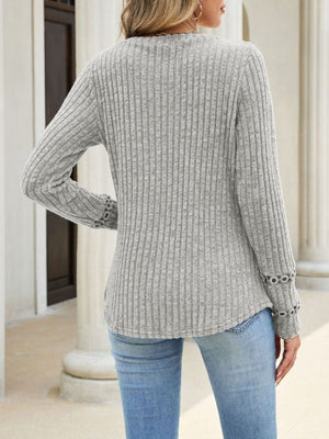 V-Neck Ribbed Knit Top With Eyelet Cuff in Black with ribbed