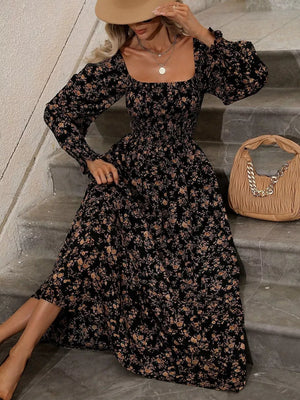 Pink midi dress with ruffled and puff sleeve