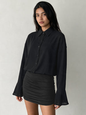 100% polyester Care instructions: Machine wash cold shirt dress in Black with bodycon silhouette