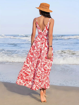 Red floral midi dress with a deep V-neck and spaghetti straps, a defined waist, and a flowy A-line skirt.