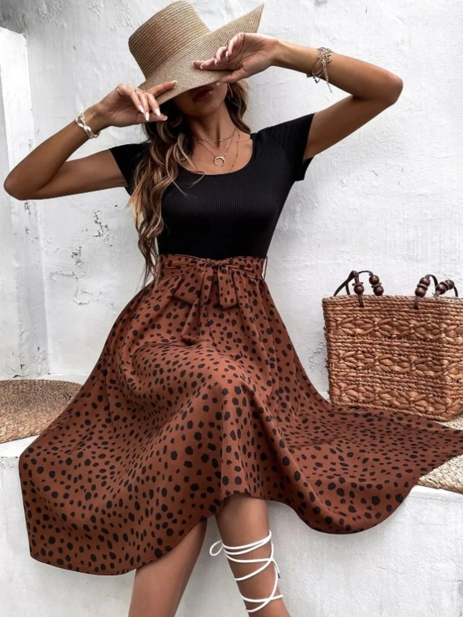 100% polyester Care instructions: Machine wash cold midi dress in Brown with A-line silhouette