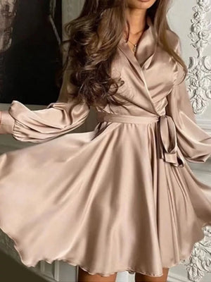 mini dress in champagne featuring tied waist and fit-and-flare fit
