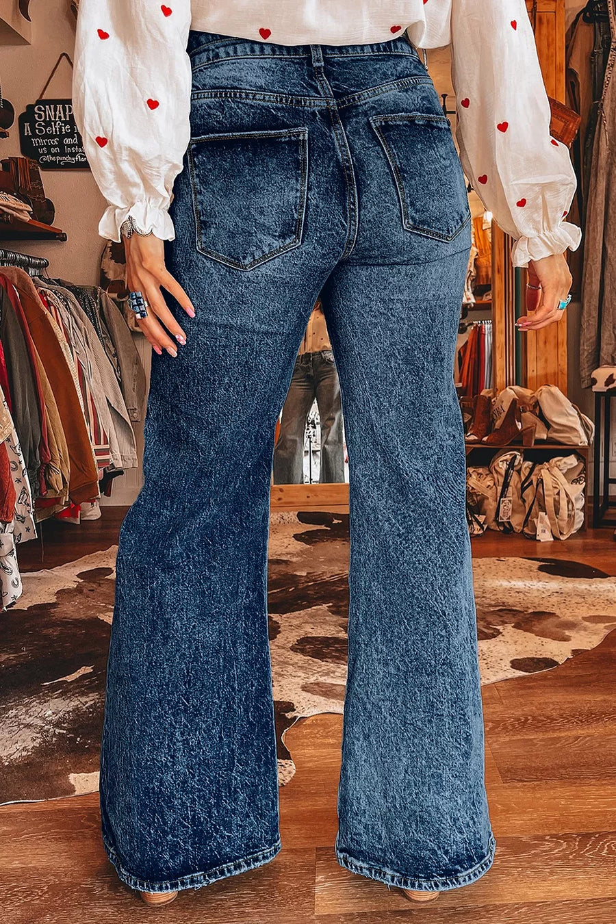 Navy flare jeans with full-length and button-front