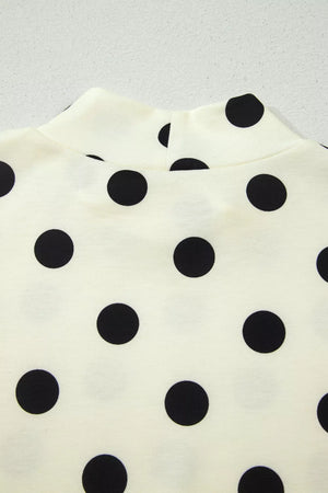 Cream polka dot mock neck top