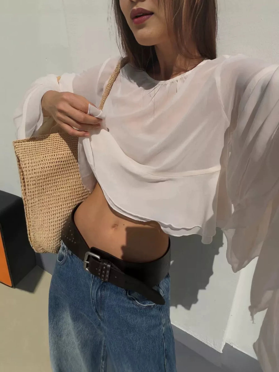 100% polyester Care instructions: Machine wash cold blouse in Apricot with relaxed silhouette