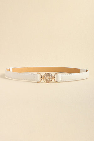 White leather belt with gold circular embellished buckle and adjustable strap