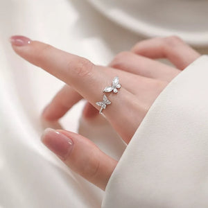 silver ring with zircon embellishment and not applicable