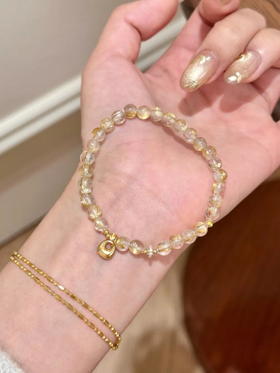 18K Gold-Plated, Crystal, Alloy Care instructions: Avoid wearing during exercise bracelet in Gold with beaded strand