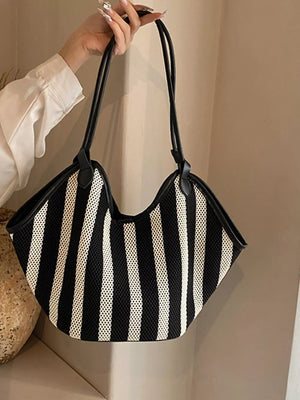 handbag in white with striped and knit texture