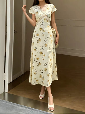 95% polyester, 5% spandex Care instructions: Machine wash cold midi dress in Yellow with A-line silhouette