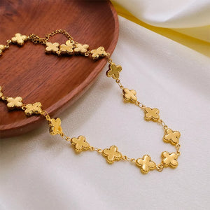 Gold necklace featuring 18K gold-plated and clover motif