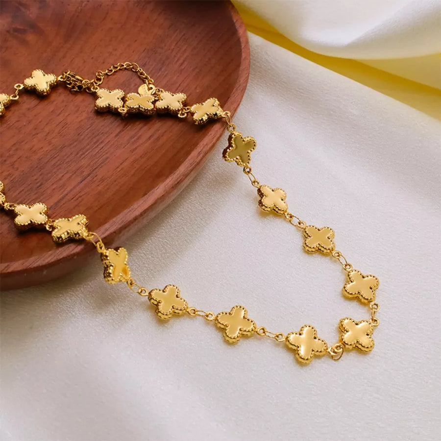 Gold necklace featuring 18K gold-plated and clover motif