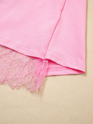 Pink cotton blend oversized tee with delicate lace trim detail.