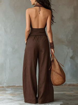 100% polyester Care instructions: Machine wash cold jumpsuit in Black with relaxed silhouette
