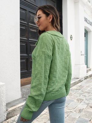 Matcha green acrylic knit sweater with textured squares and polo neckline.