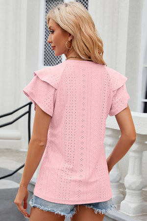 Eyelet flutter sleeve blouse in dusty pink with a textured pattern.