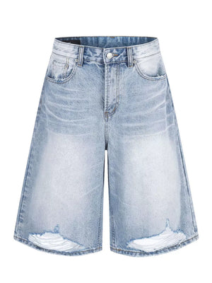 jeans in light blue featuring distressed and wide-leg fit