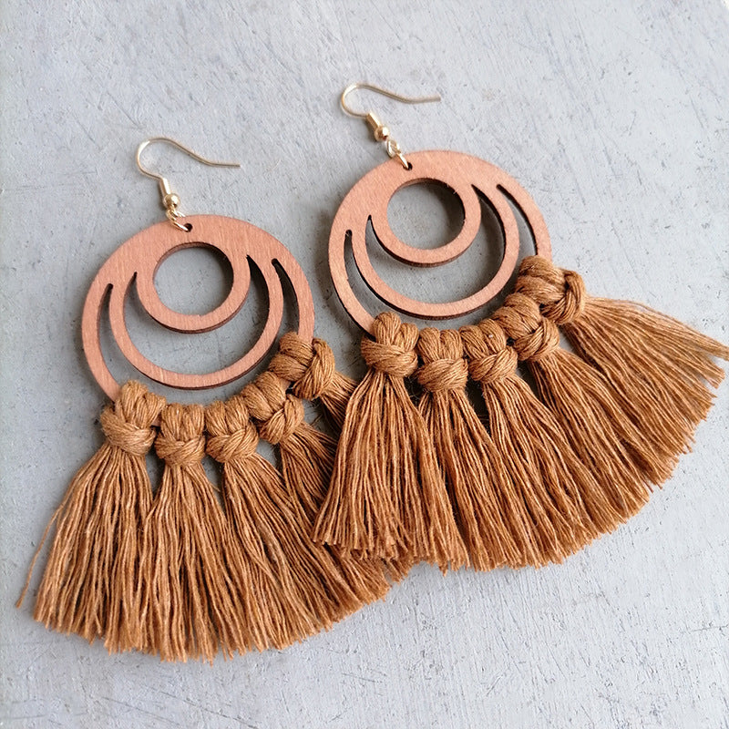 Brown wood hoop earrings with knotted fringe tassels