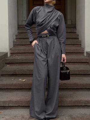 80% Polyester 20% Viscose Care instructions: Machine wash cold two-piece set in Gray with relaxed silhouette
