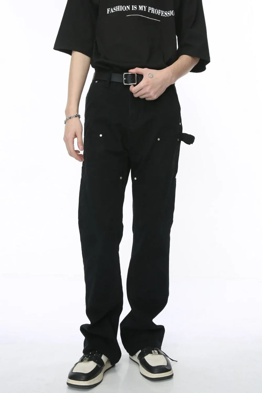 Black wide leg carpenter pants with utility details and silver hardware.