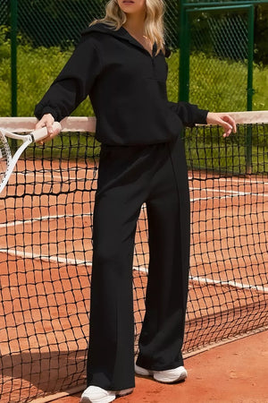 50% polyester, 45% viscose, 5% elastane Care instructions: Machine wash cold sweatshirt and sweatpants set in Black with