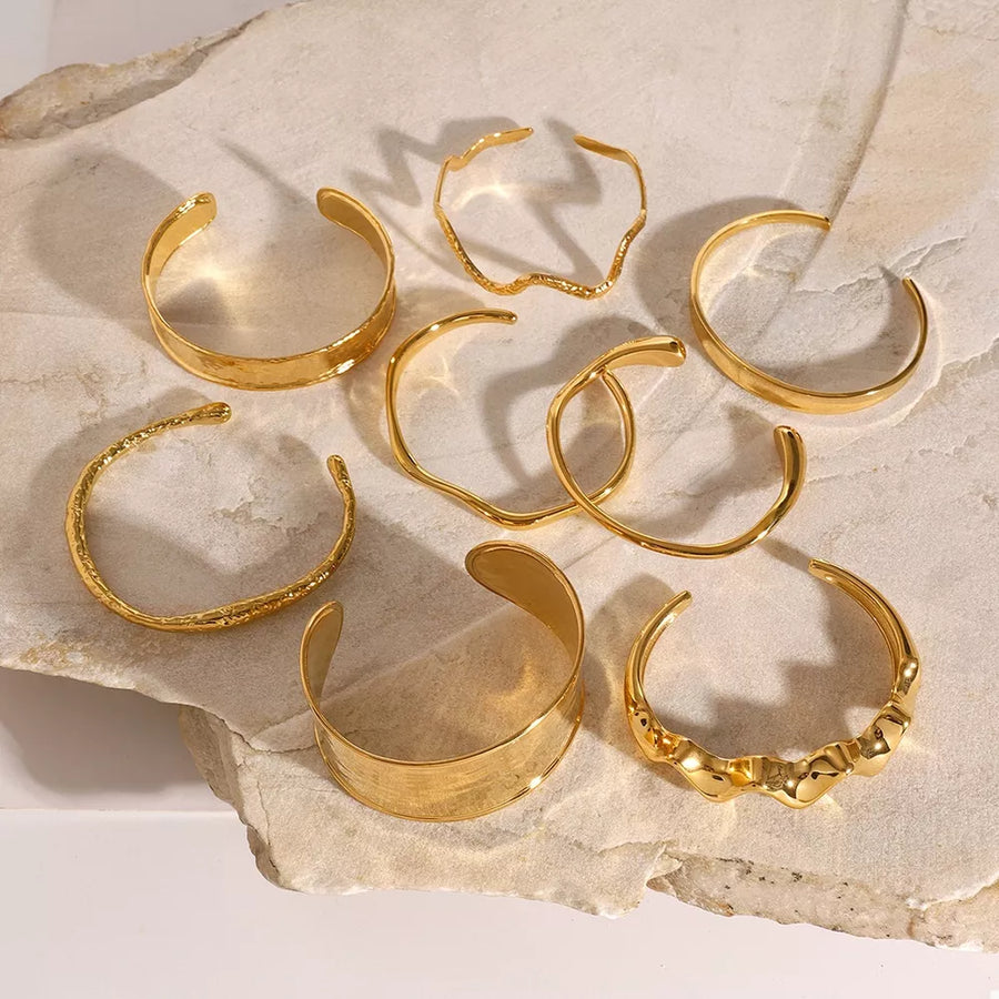 bracelet in gold featuring open cuff and band fit