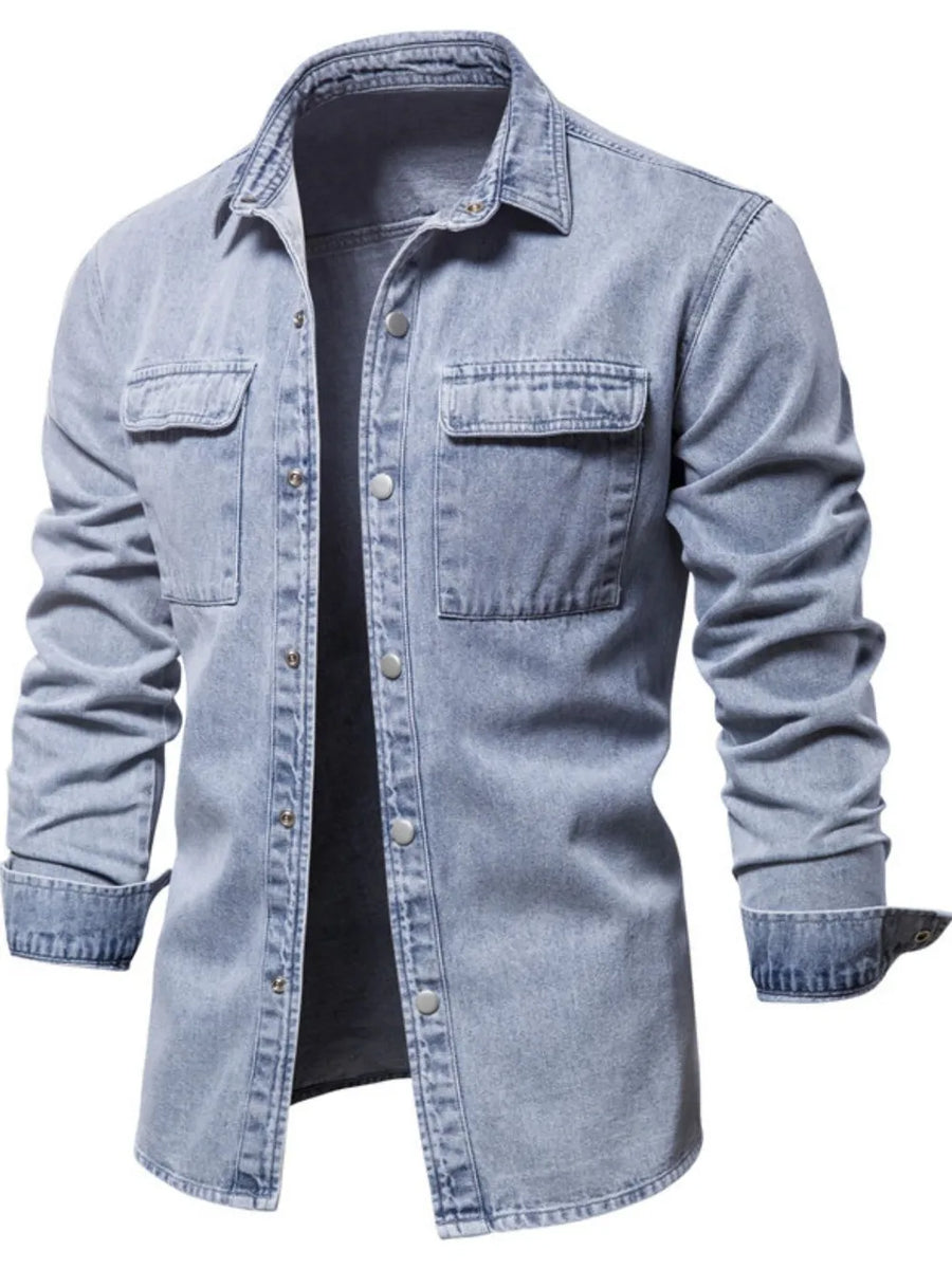 Light faded denim utility shirt jacket with buttoned chest pockets and collar.