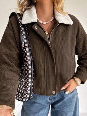 100% polyester Care instructions: Machine wash cold trucker jacket in Brown with relaxed silhouette