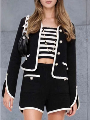 blazer in black featuring buttoned and boxy fit