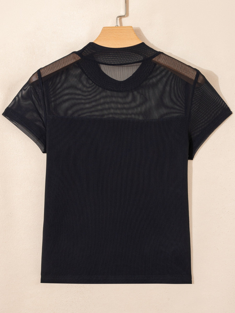 Black sheer mesh cap sleeve t-shirt with mock neck and ribbed body.
