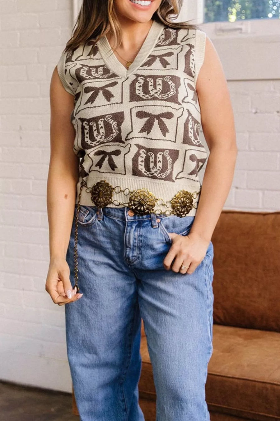 brown sweater vest featuring sleeveless and Western Horseshoe Bow Pattern