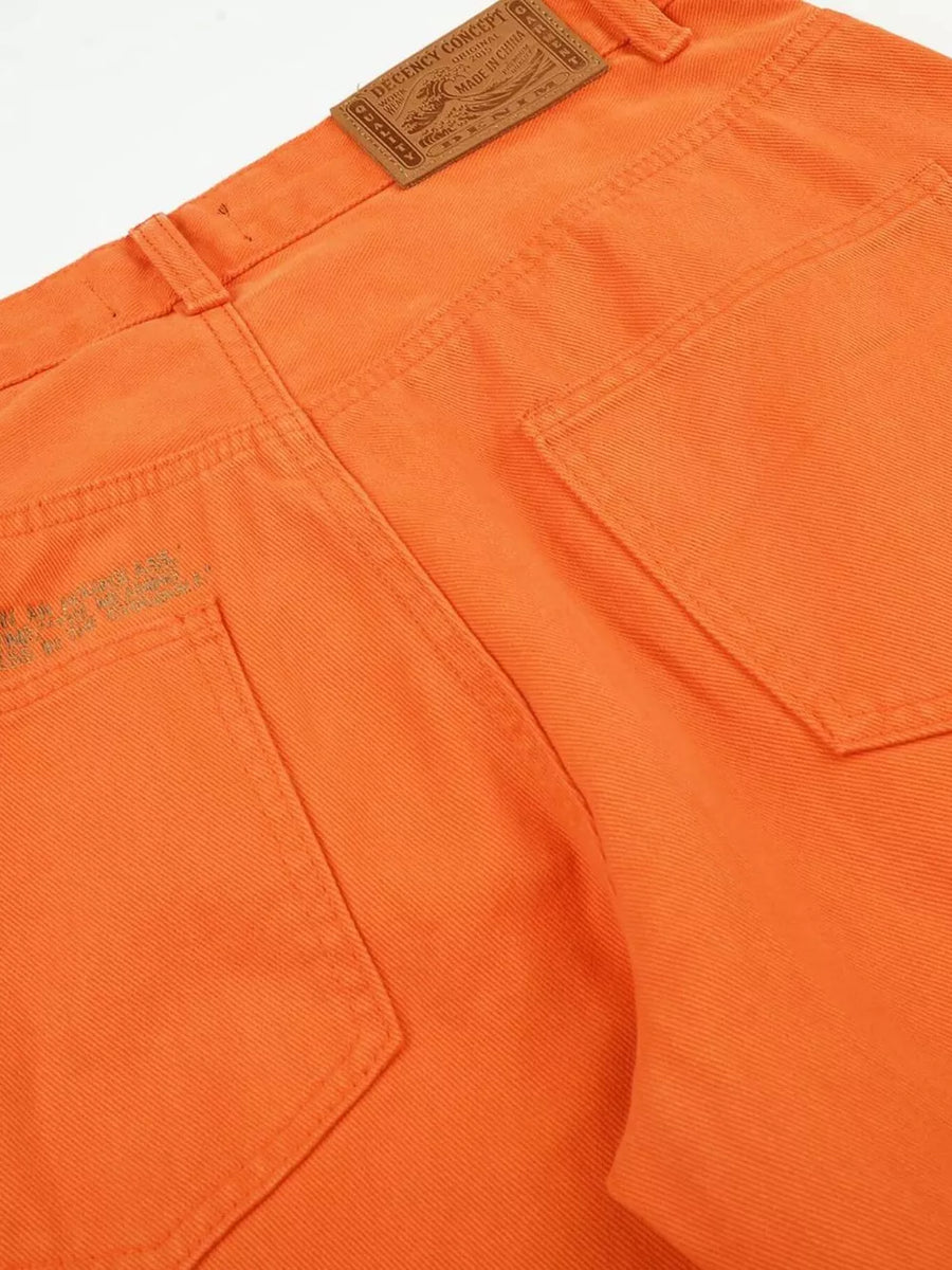 wide-leg pants in Orange with pocketed and full-length