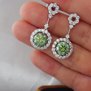 earrings in White with drop design and dangle
