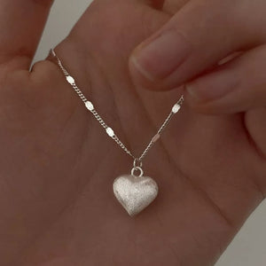 silver necklace with collarbone length and clasp