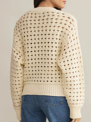 Beige openwork knit cardigan with a zip-up front and ribbed trim.