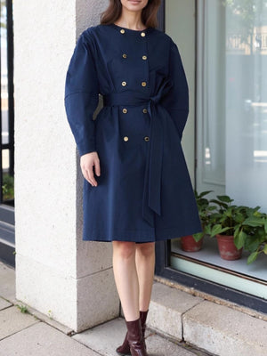 navy blue trench coat with below-knee and button-front