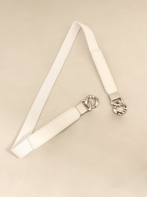 White elastic belt with faux leather ends and silver chain detail