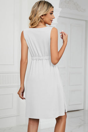 White sleeveless a-line summer dress with elastic waist and side slit hem