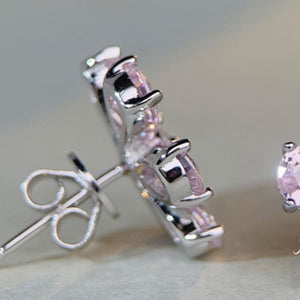 earrings in silver with floral and zircon stones