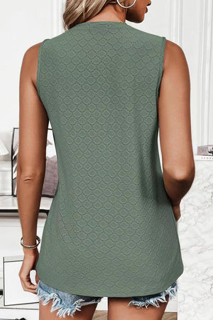 Textured sleeveless scoop neck top in matcha green with eyelet pattern detail