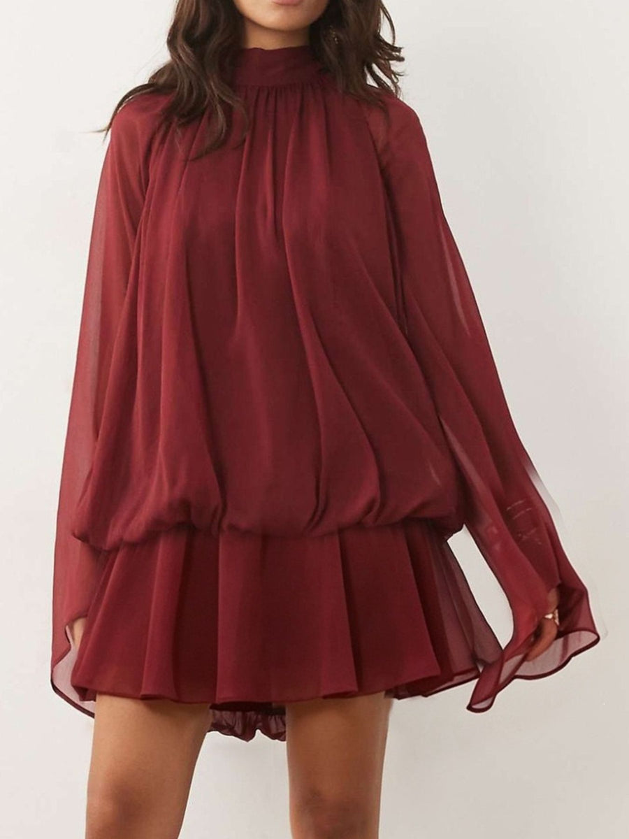 mini dress in Purple with mock neck and bell sleeve