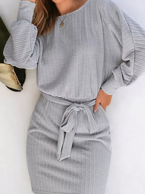 100% polyester Care instructions: Machine wash cold sweater dress in light gray with fitted silhouette