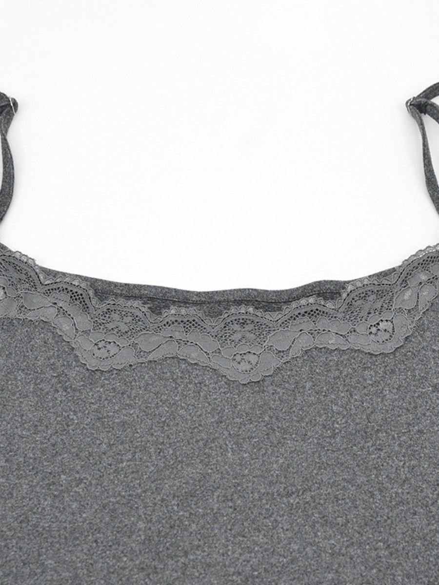 Grey bodycon mini dress with lace trim neckline and spaghetti straps.