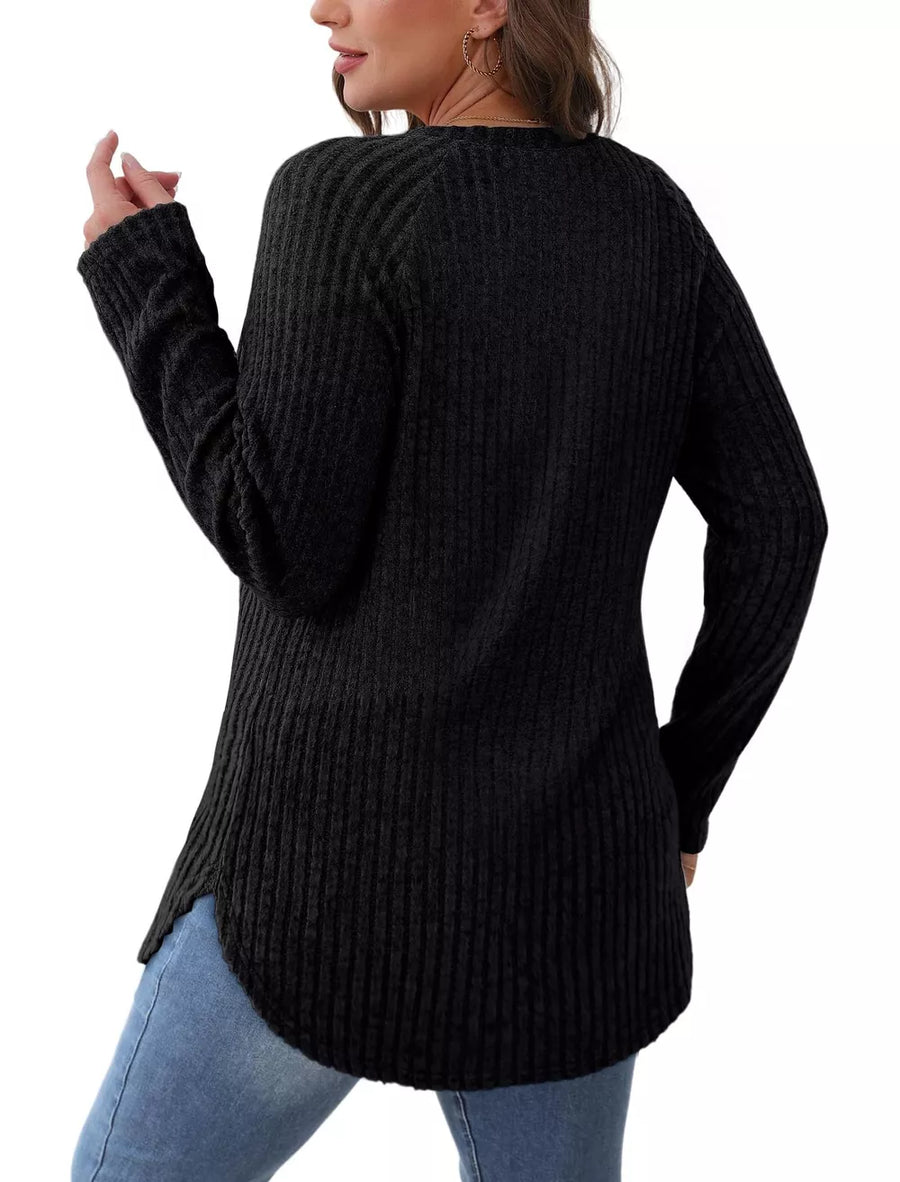 Black ribbed knit long sleeve maternity t-shirt with crew neck and curved hem.