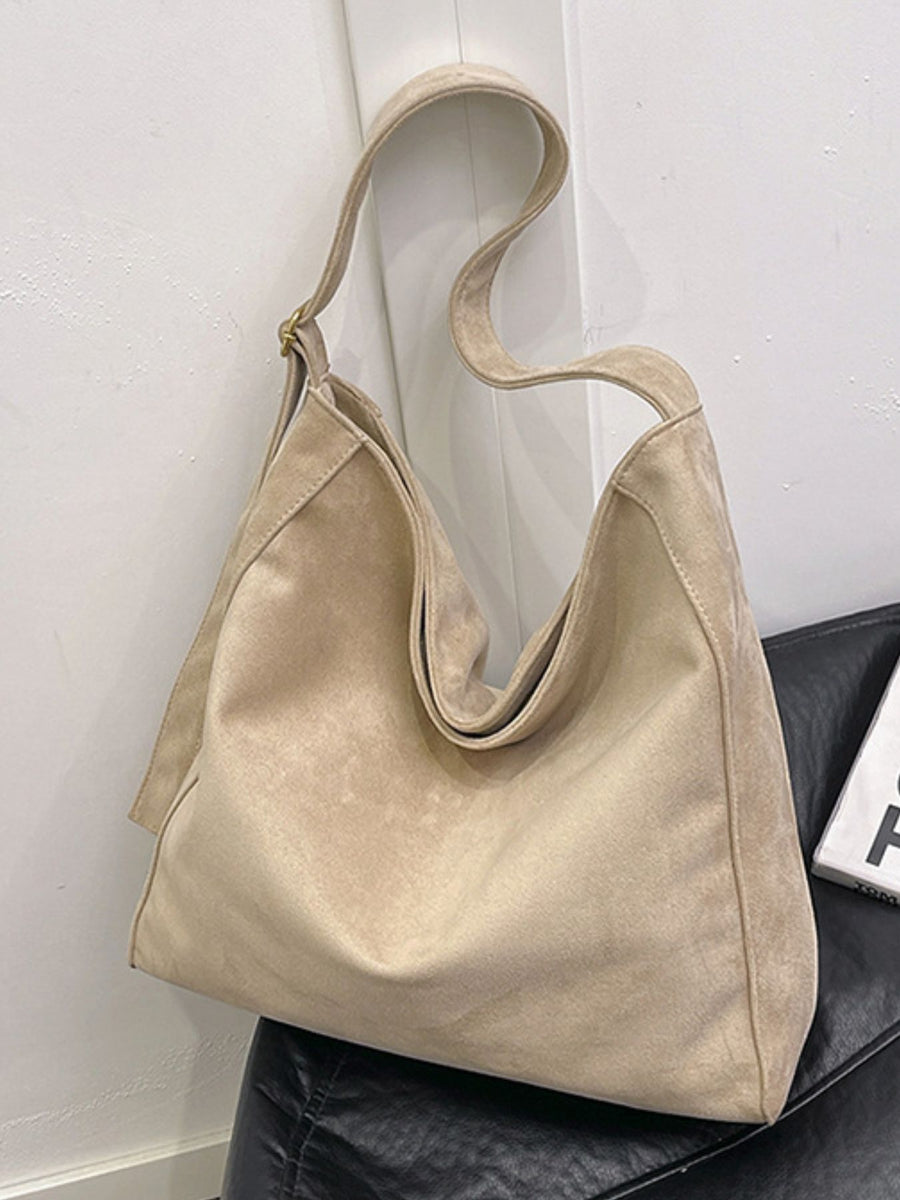 light beige crossbody bag with large and zip-front
