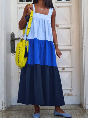 Three-tone wide strap dress with square neckline and tiered skirt in light blue, royal blue, and navy.