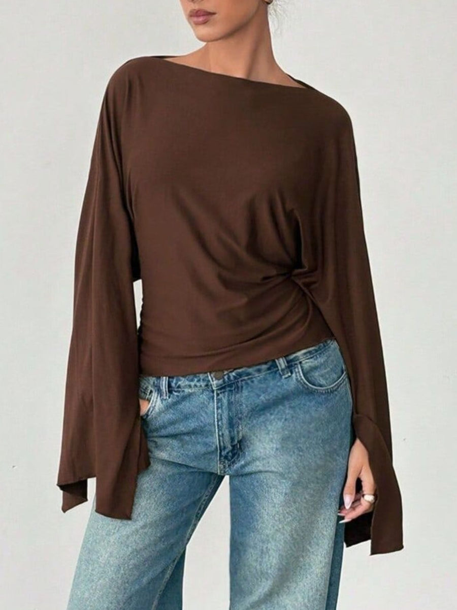 dark brown top with batwing sleeves and long sleeve