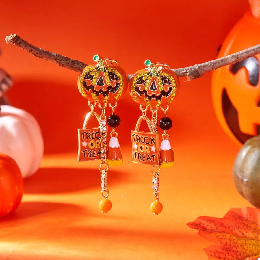 earrings in orange with novelty print and rhinestone embellishment