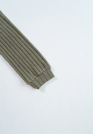 Ribbed knit long sleeve top in army green with a subtle leopard pattern detail.