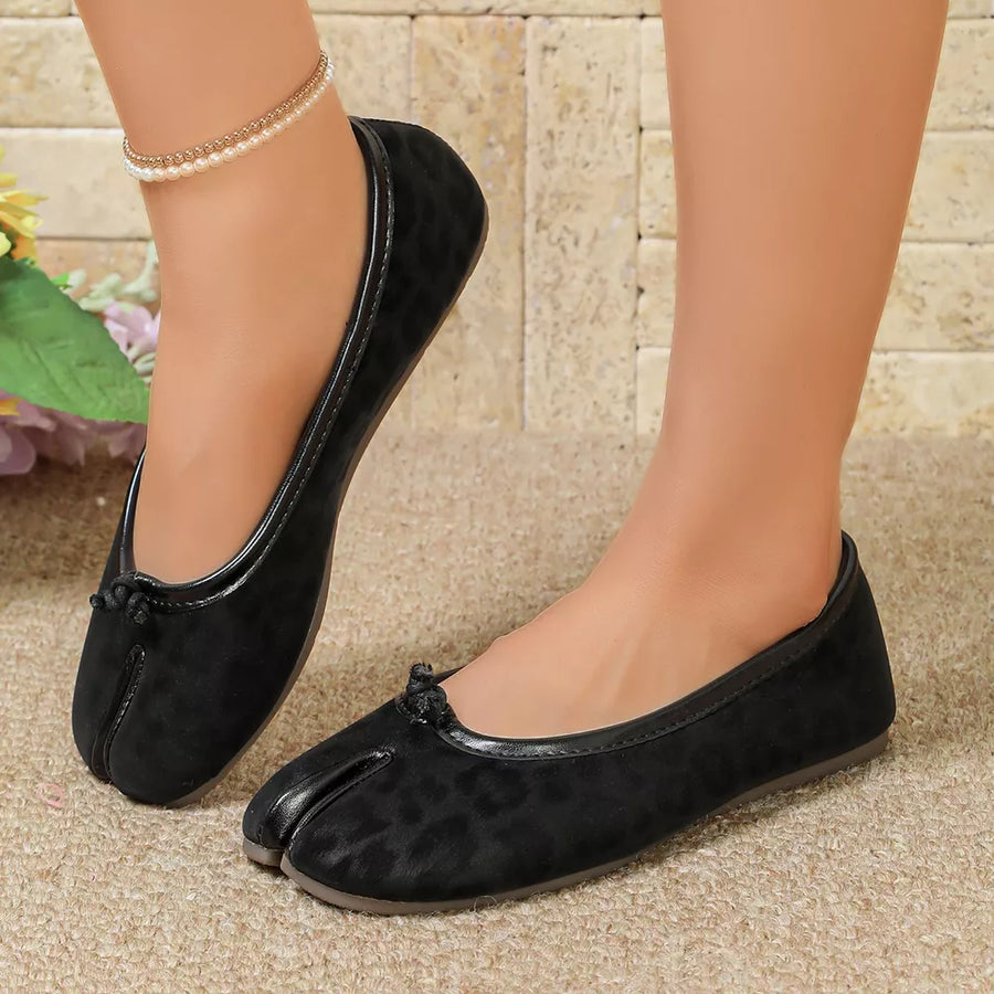 brown flats featuring split-toe and leopard-print